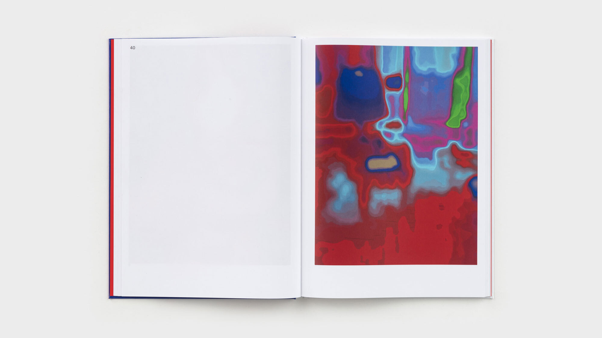 A spread of pages 40 and 41. 40 is blank, with only the page number in the upper left corner. 41 contains a thermal-image painting bounded by white-space. It contains amorphous cells of teal, navy, orange, green, and red.